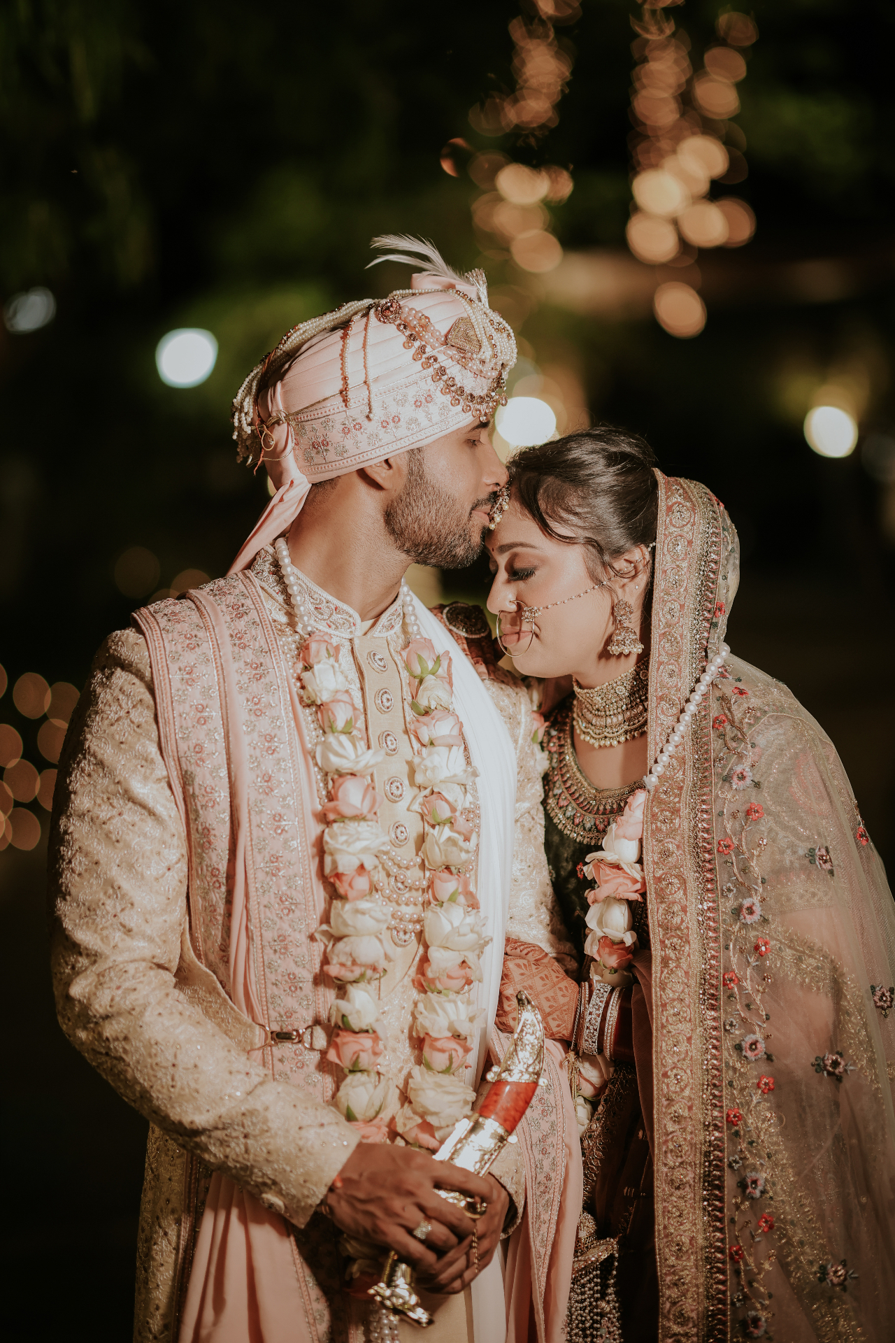 Bride and groom in traditional Indian wedding attire
